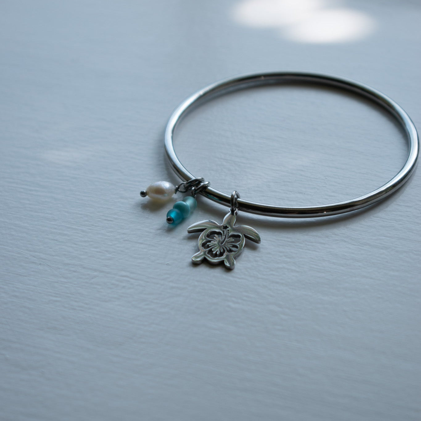 Silver Hibiscus Turtle Charm Bangle