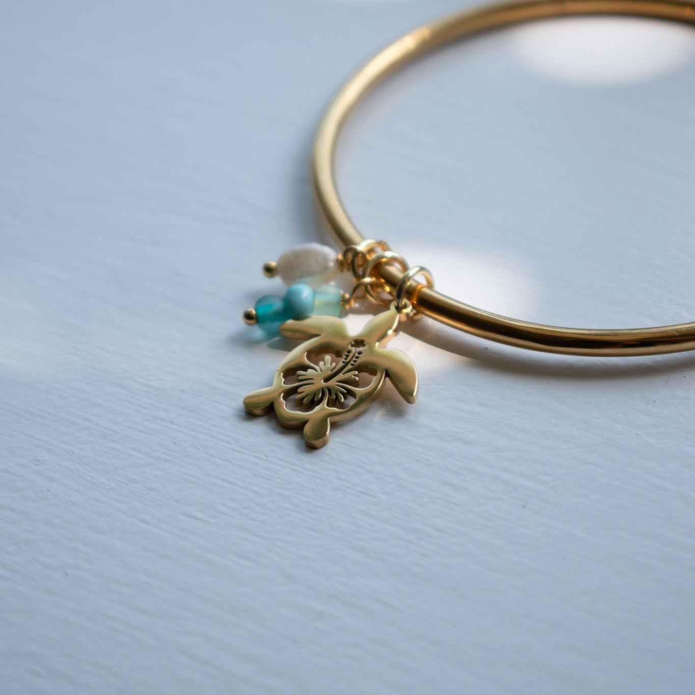 Gold Hibiscus Turtle Charm Bangle