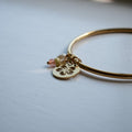 Gold Hibiscus Circle Charm Bangle