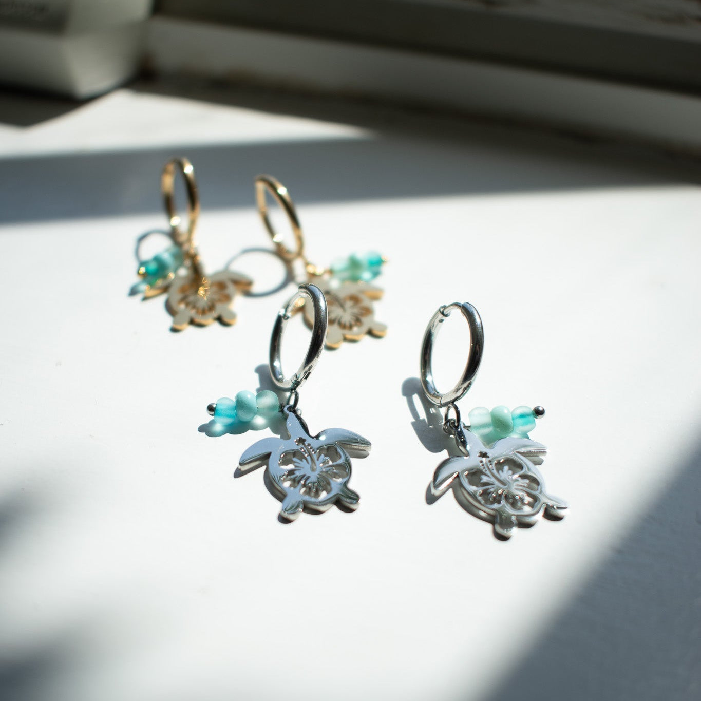 Silver Hibiscus Turtle Charm Earrings