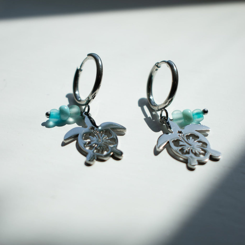 Silver Hibiscus Turtle Charm Earrings