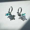 Silver Hibiscus Turtle Charm Earrings