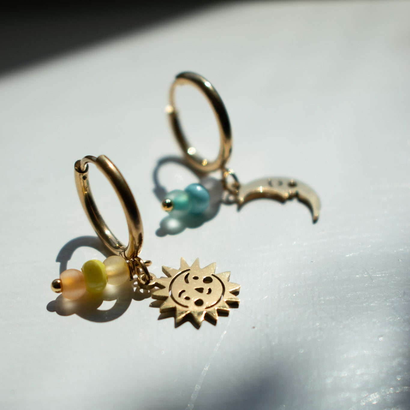 Gold Sun and Moon Charm Earrings