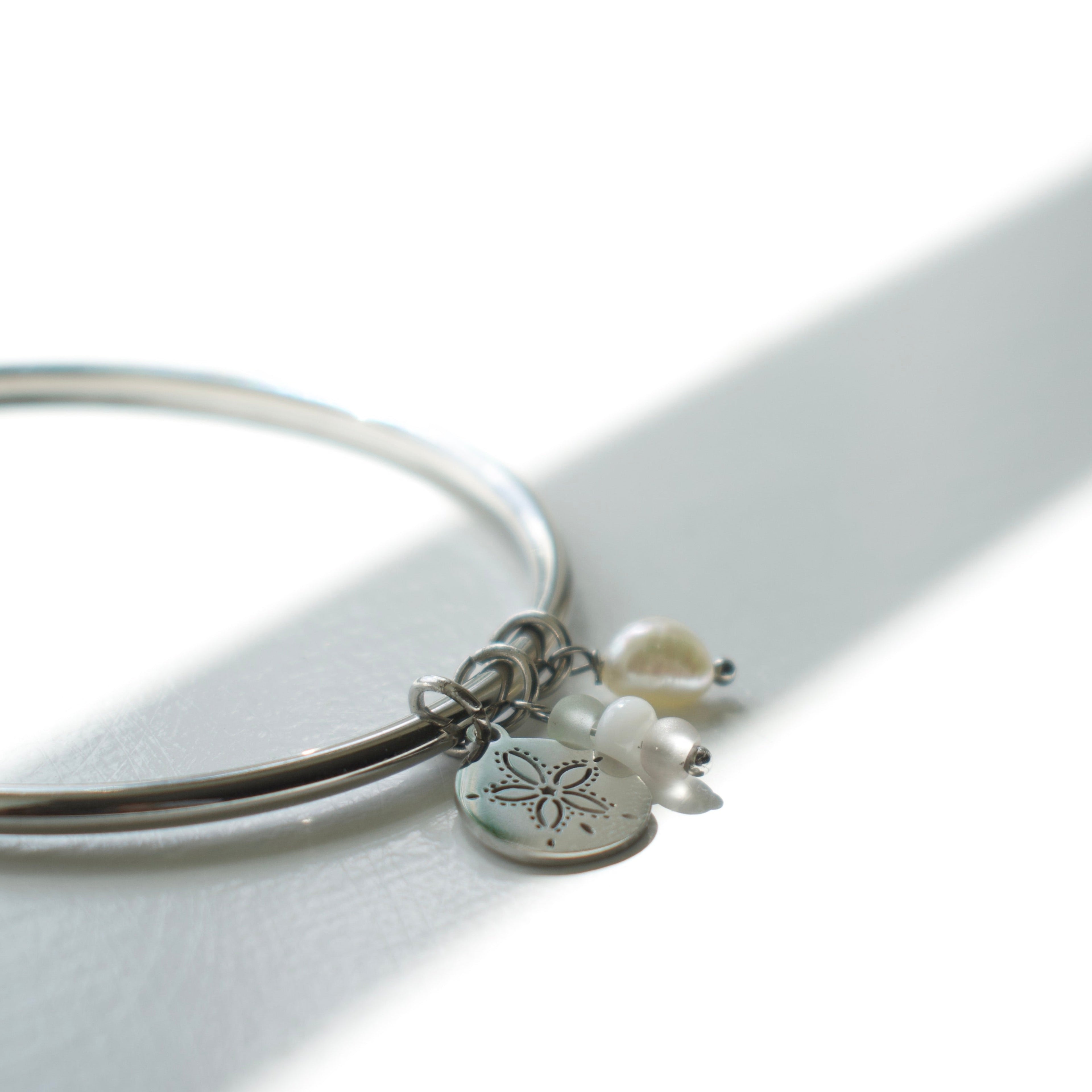 Silver Sand Dollar Charm Bangle