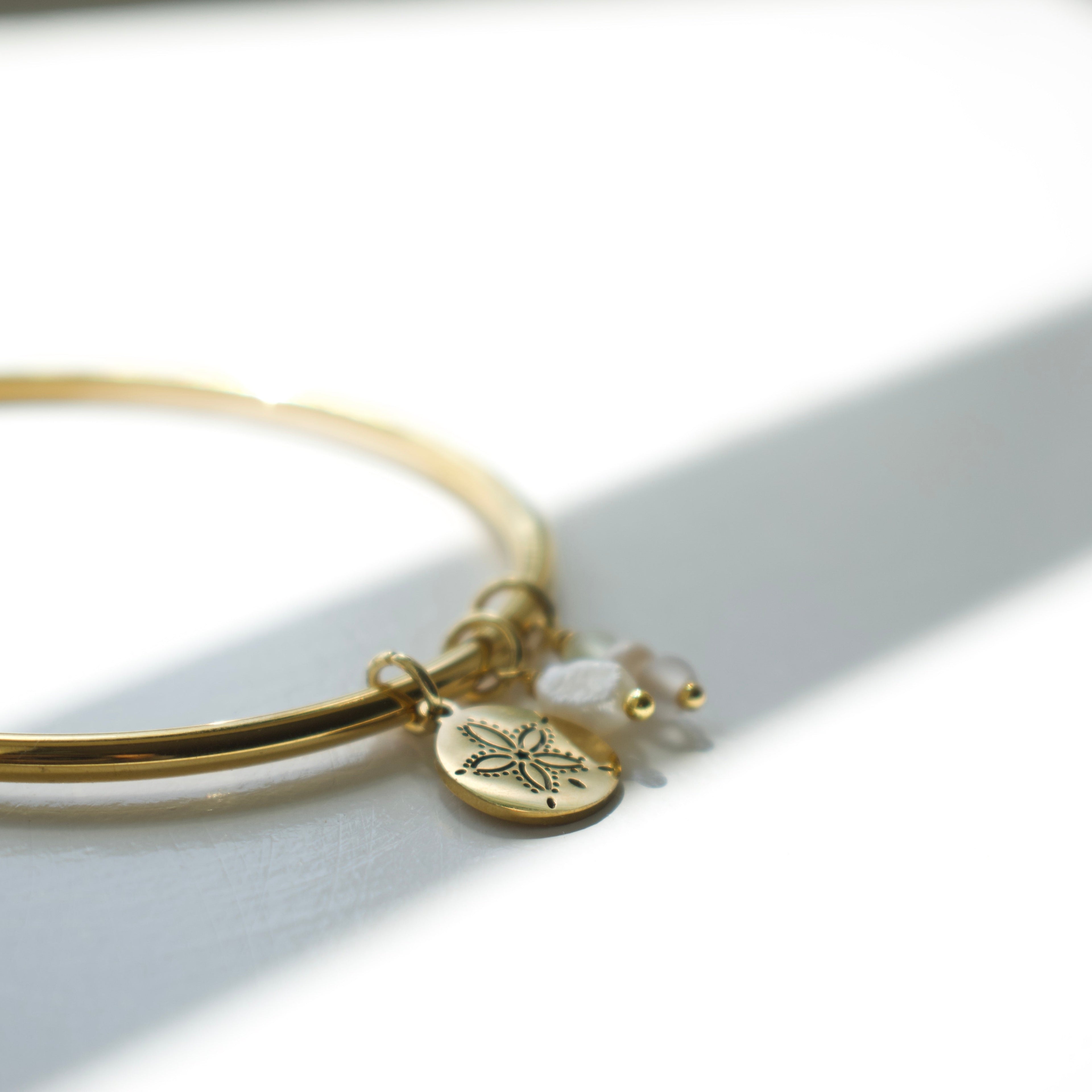 Gold Sand Dollar Charm Bangle