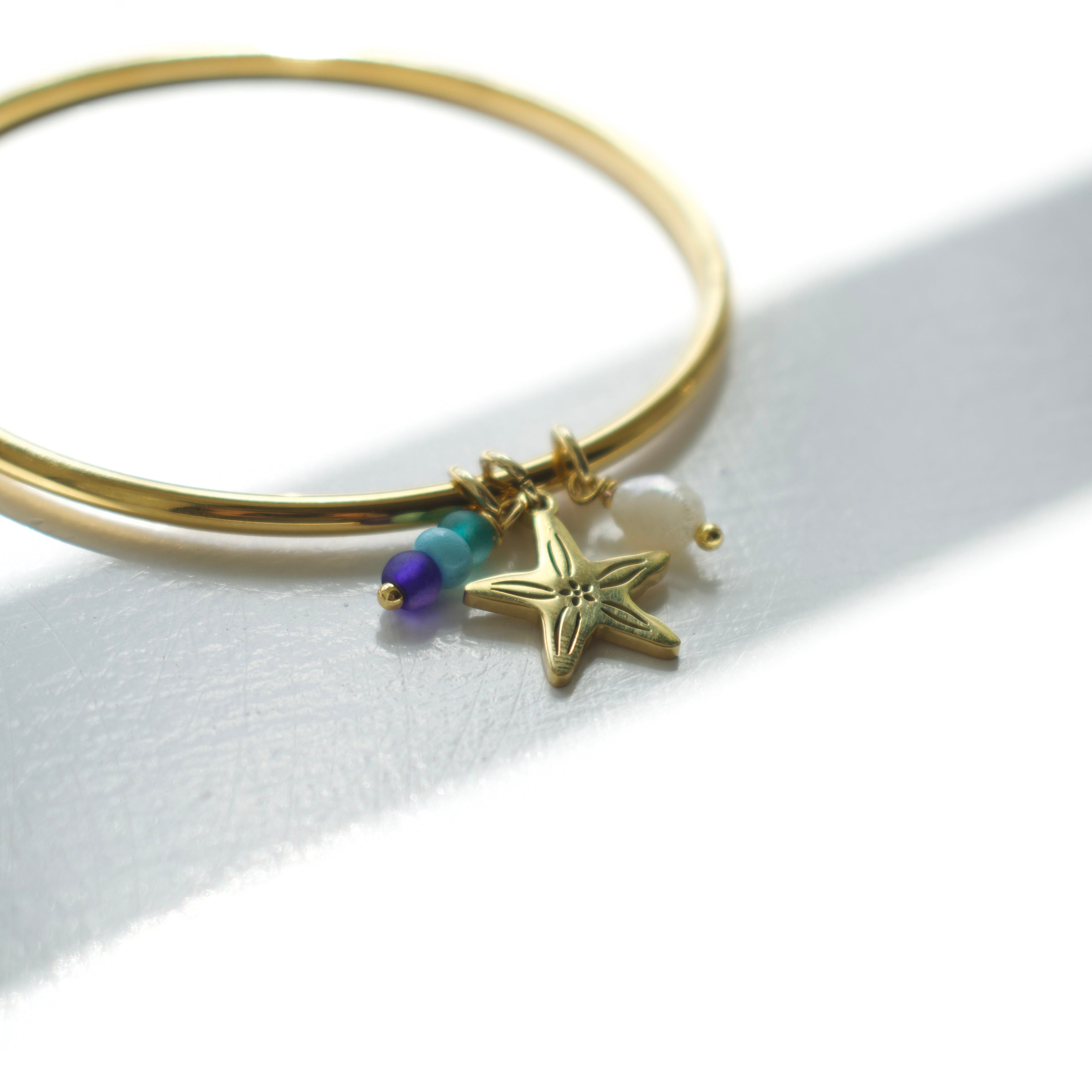 Gold Starfish Charm Bangle