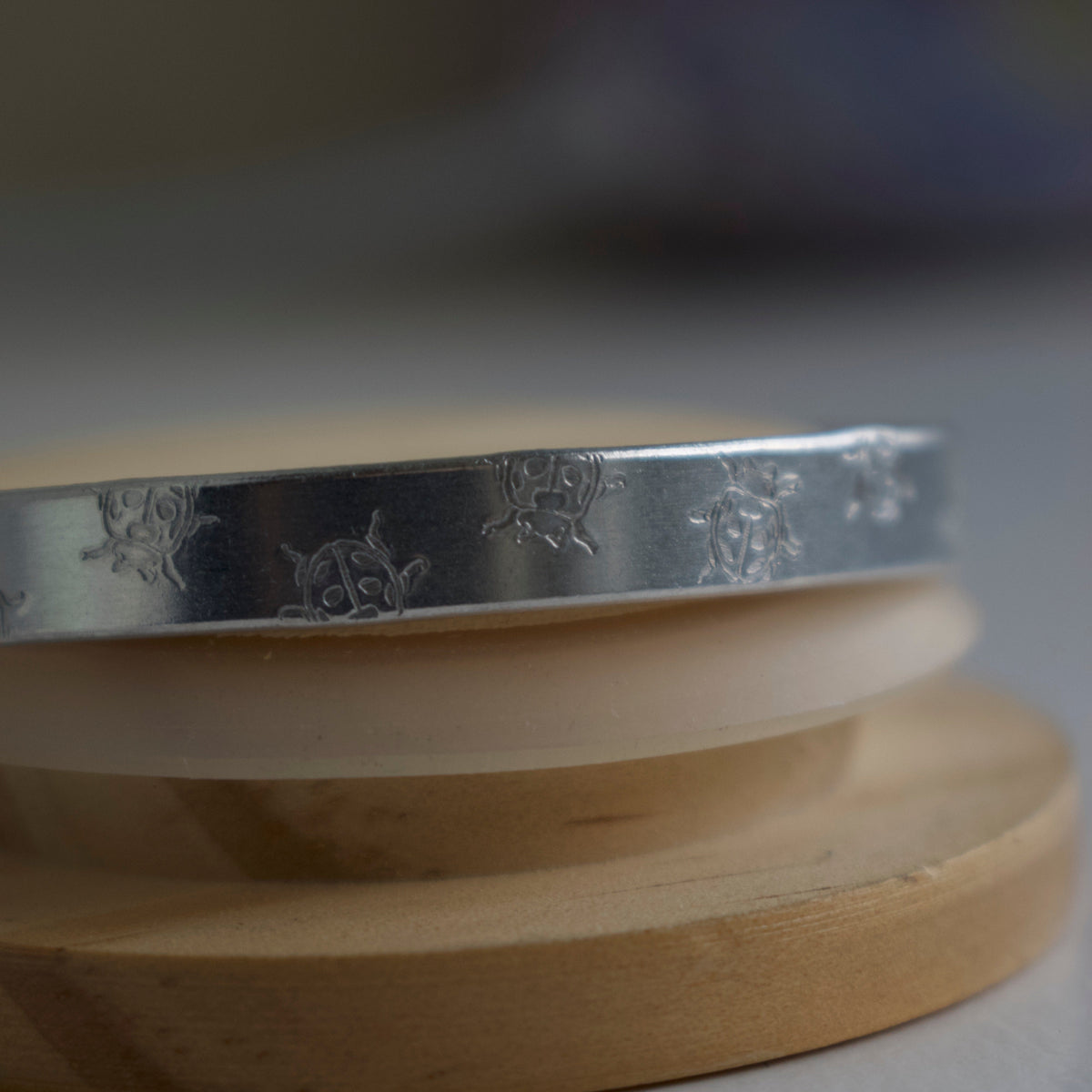 Silver Ladybug Hand-Stamped Bangle